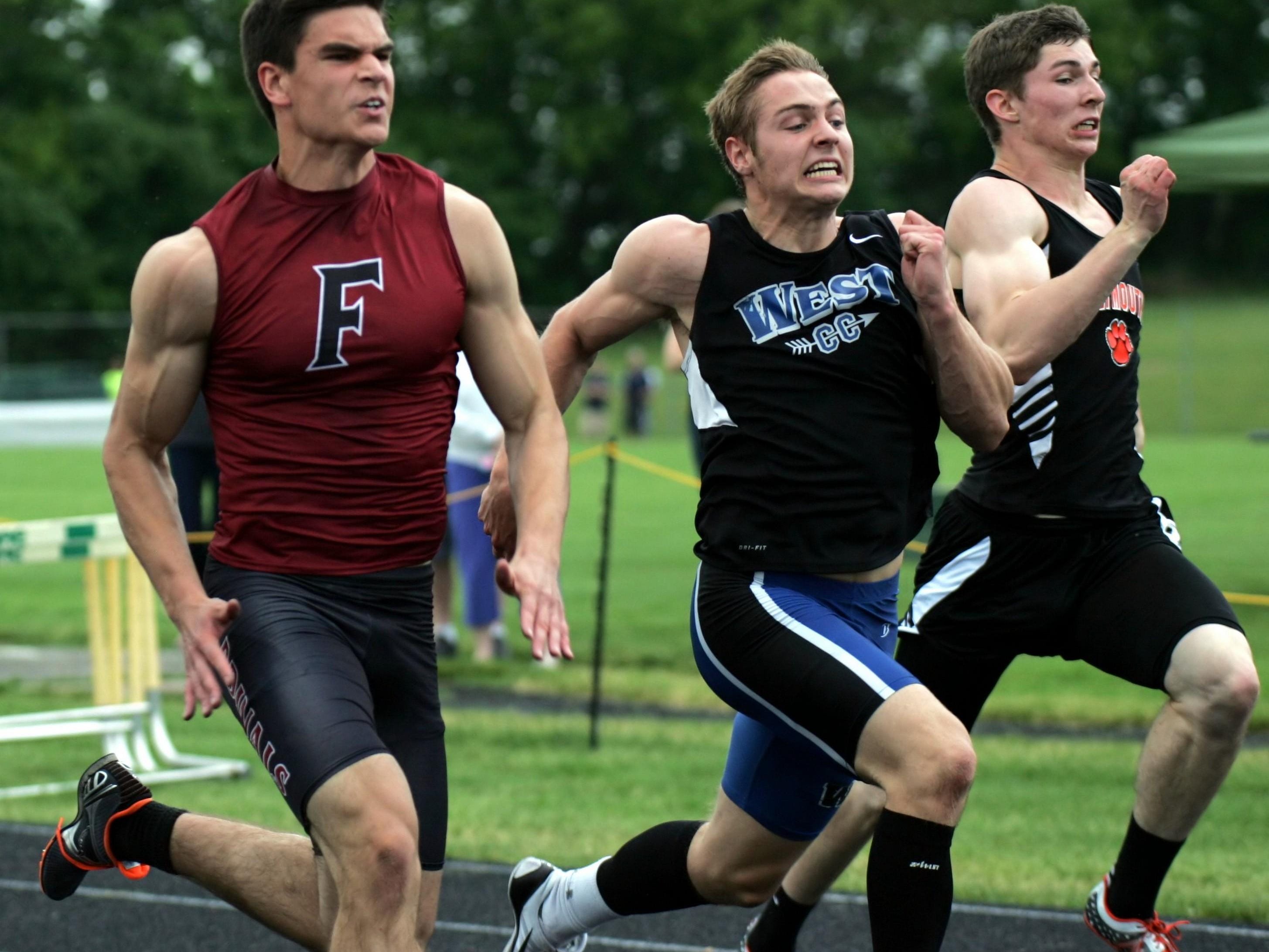 Fond du Lac’s Nick Park (left) competes in the 100-meter dash in last Friday’s Division 1 sectional track and field meet at Beaver Dam.
