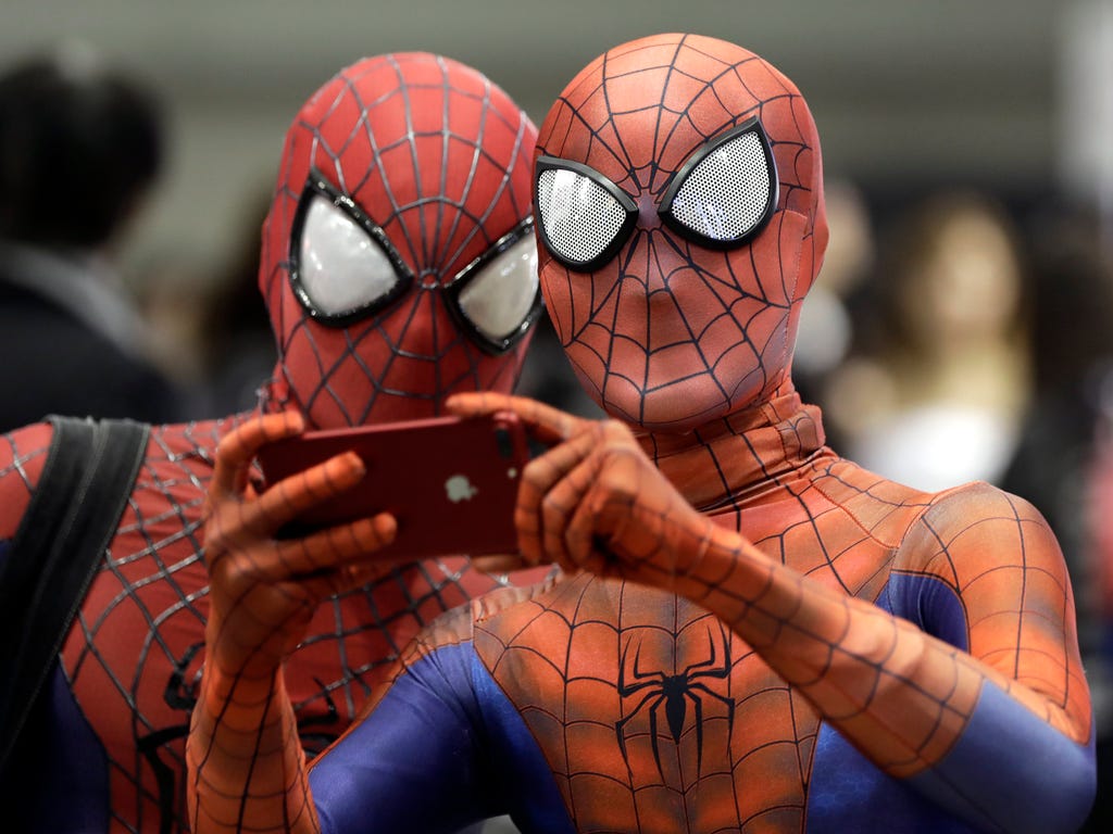 Cosplayers dressed as Spider-Man take a photo during the Tokyo Comic Convention 2017 at Makuhari Messe in Chiba, east of Tokyo. The event, running through Dec. 3,  offers comic fans an enthusiastic experience with exhibitions and displays of Japanese