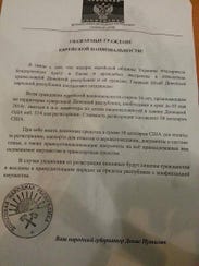 A leaflet distributed in Donetsk, Ukraine, calls for