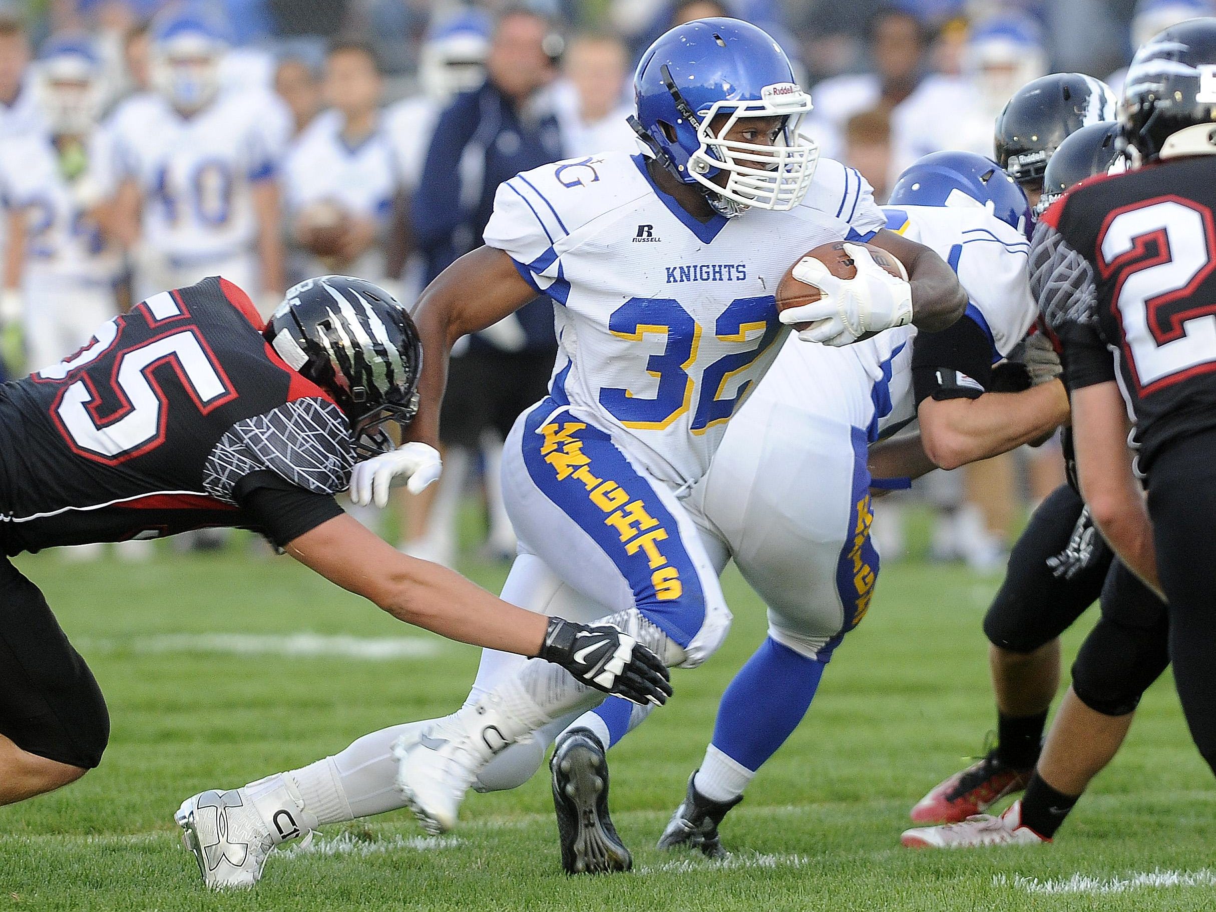 Dodi Makwinja runs against Brandon Valley in September. Makwinja rushed 15 times for 128 yards and two scores in the Knights’ 42-10 win over Watertown last Friday.