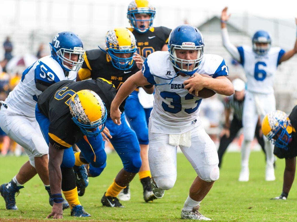 Stephen Decatur senior Dryden Brous scores a touchdown against Wi-Hi on Saturday. Brous has close to 300 yards and four touchdowns in two games but it’s the offensive line he is thanking.