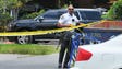Investigators at the scene of a mass shooting at the