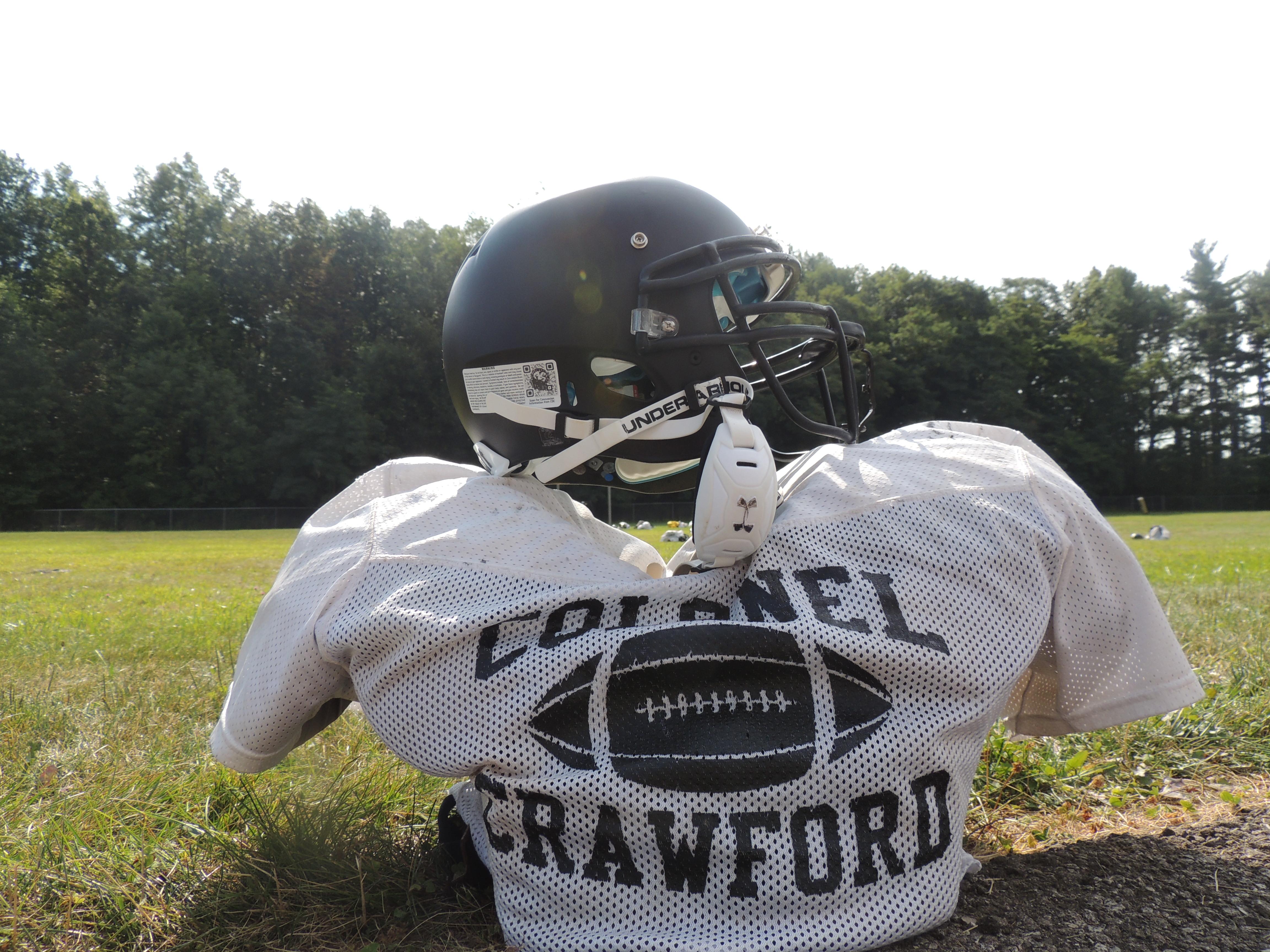 Colonel Crawford players leave their pads and helmets on the practice field while they take a break during two-a-days.