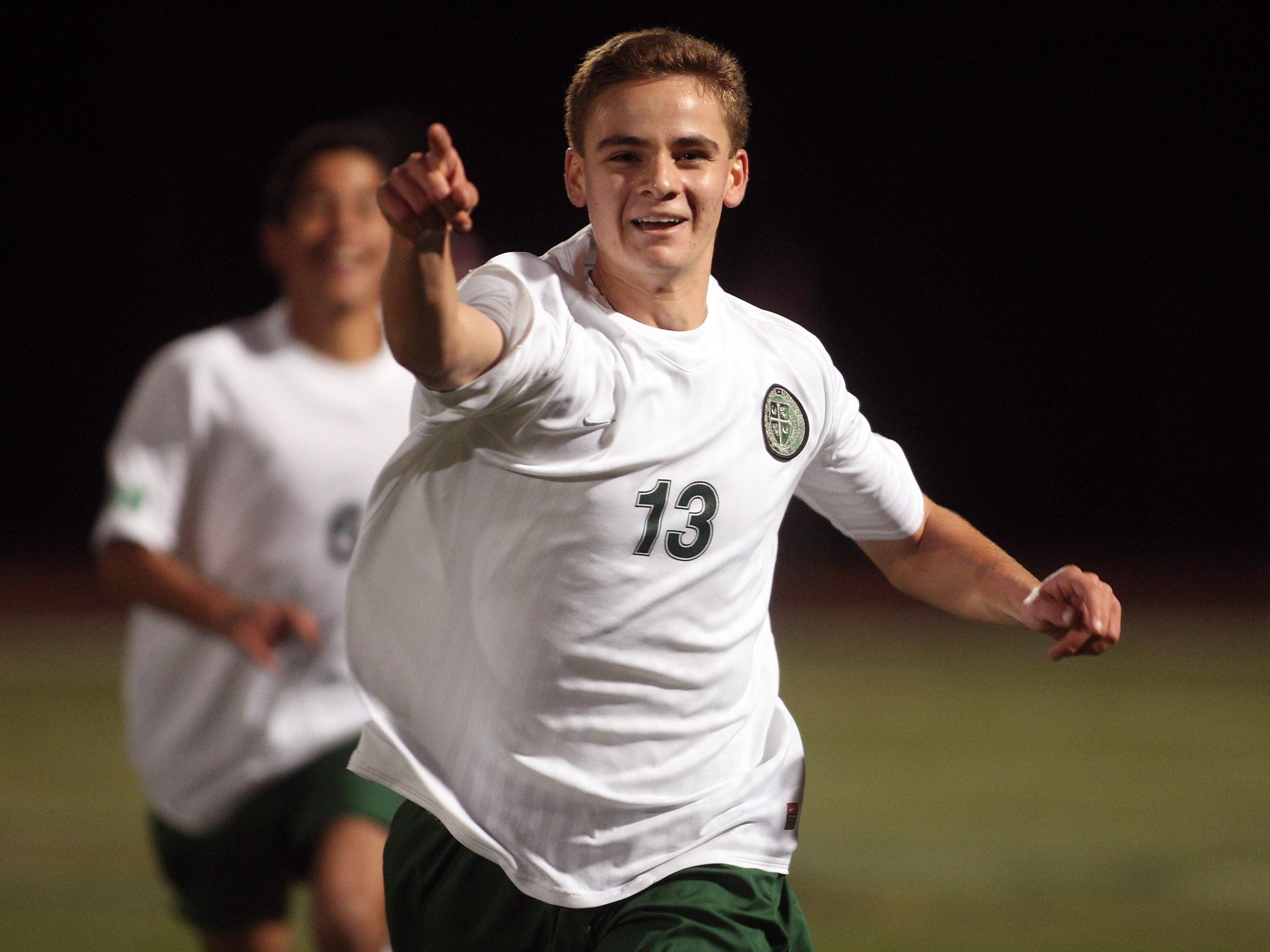 Steven Hadley points to the Delbarton fans after scoring in the Morris County Tournament boys soccer final last year.