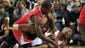 Los Angeles Clippers point guard Chris Paul (3) and Portland Trail Blazers point guard Damian Lillard (0) scramble for a loose ball during the first quarter of the game at Moda Center.