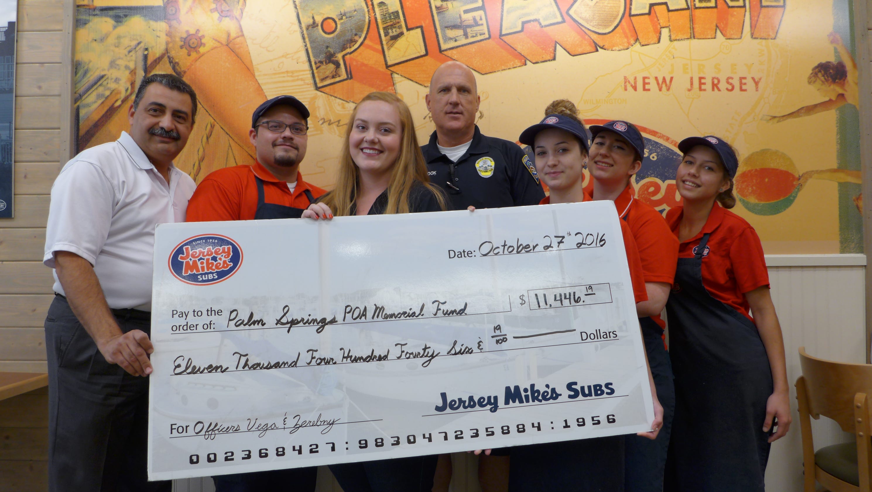 Jersey Mike's presents check to Palm Springs POA - The Desert Sun