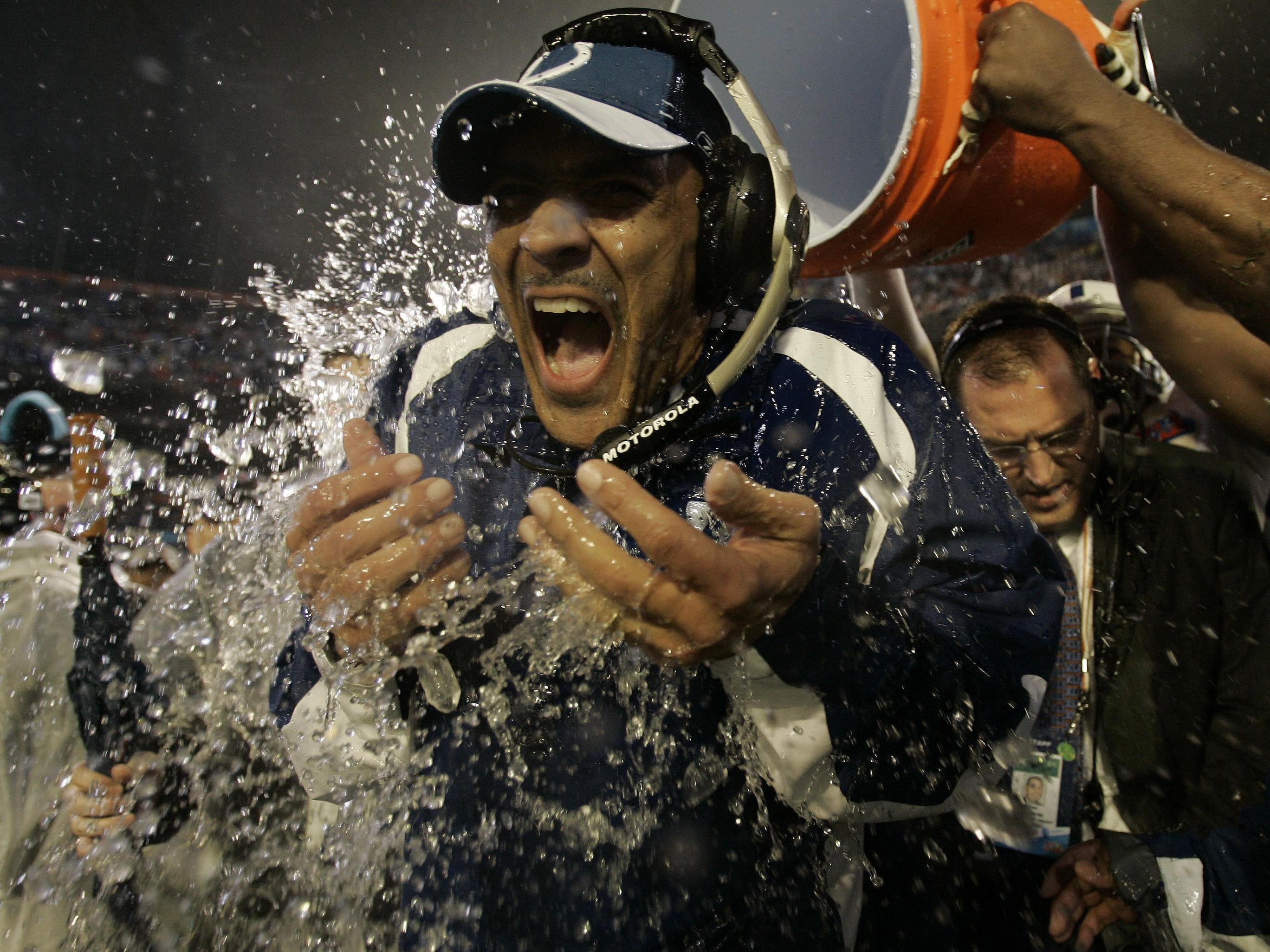 Tony Dungy is showered after the Indianapolis Colts team he coached won the Super Bowl, 29-17, over the Chicago Bears on Feb. 4, 2007.