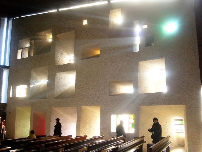 Within                                                           the church,                                                           sunlight                                                           streams                                                           through