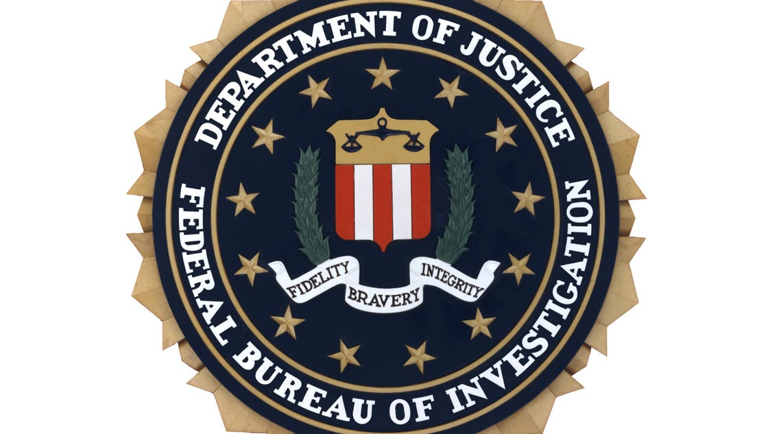 FBI guns, badge stolen from locked vehicle