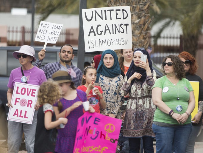 People of all faiths gather during a rally of solidarity