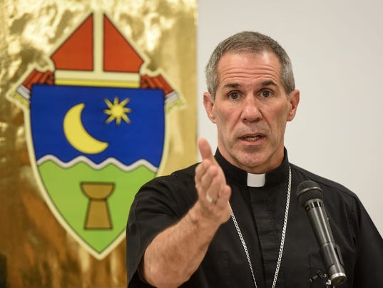 636222866946536862-Archdiocese-PressCon-MAIN.jpg