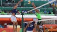 Phil Dalhausser of the United States spikes over Juan