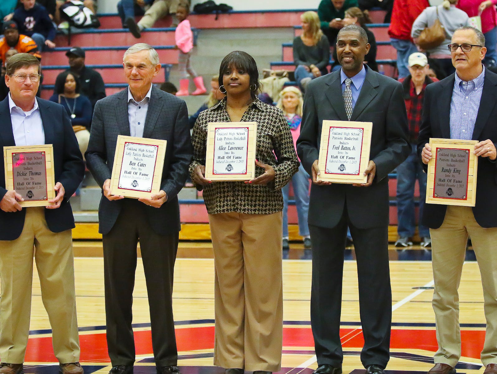 Oakland inducted its first basketball hall of fame class on Tuesday. From left, former boys coach Dickie Thomas, former girls coach Ben Cates, former girls standout Alice Lawrence, former boys standout Fred Batten Jr. and former boys coach Randy King were all inducted.
