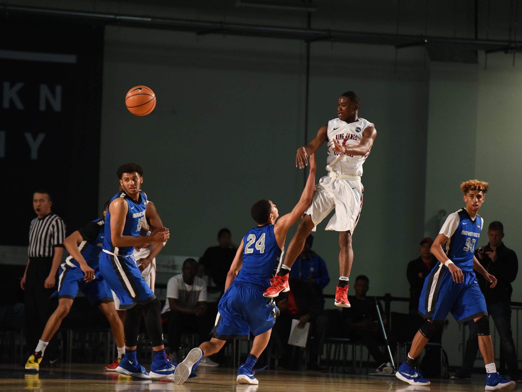 BROOKLYN, NY - APRIL 17: Nike EYBL. Session 1. Markell Johnson #1 of King James passes. (Photo by Jon Lopez)