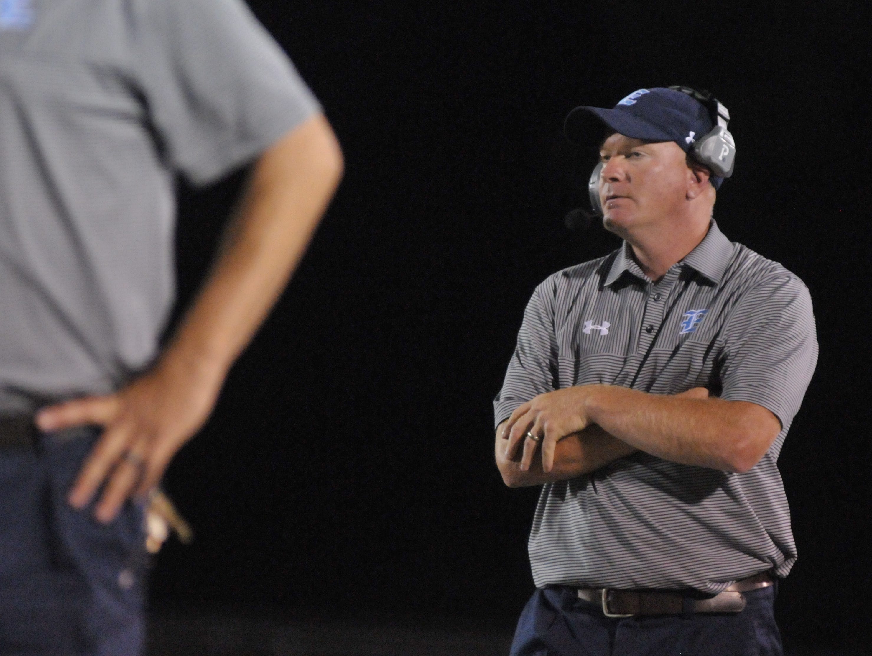 Enka football coach Jeff Frady.
