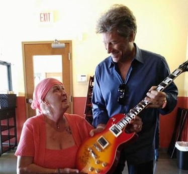 Jon Bon Jovi surprises cancer patient with kiss