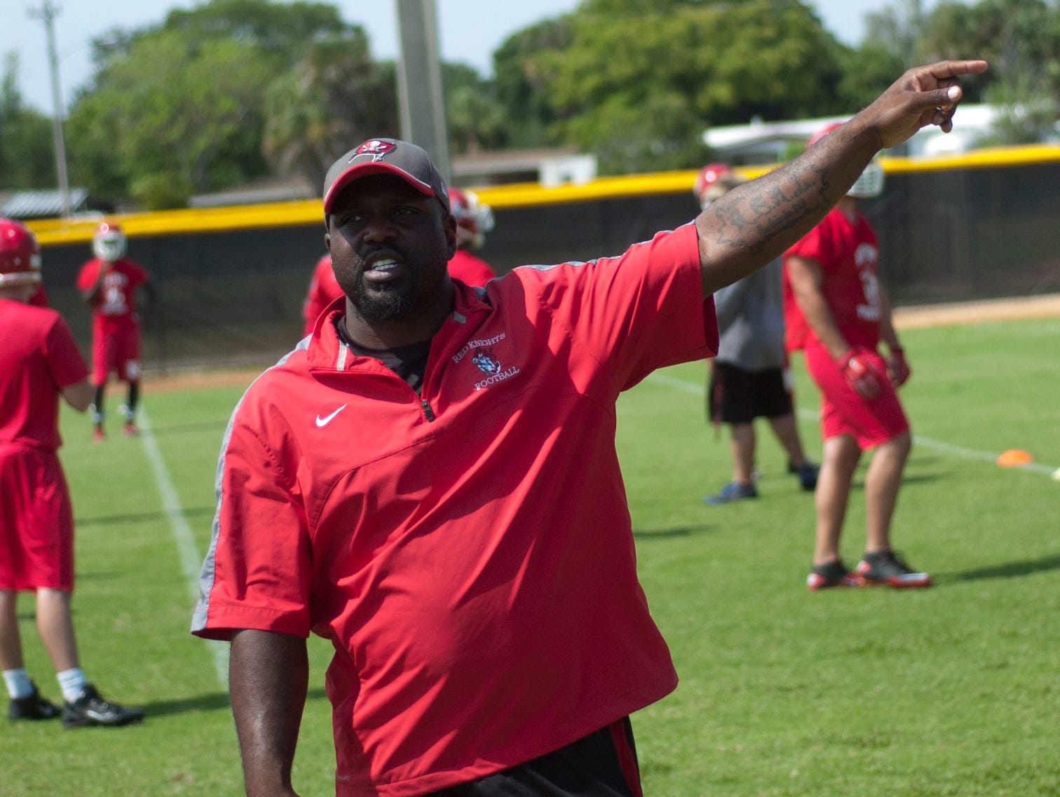 North Fort Myers head coach Earnest Graham coaches his players last year during spring practice.