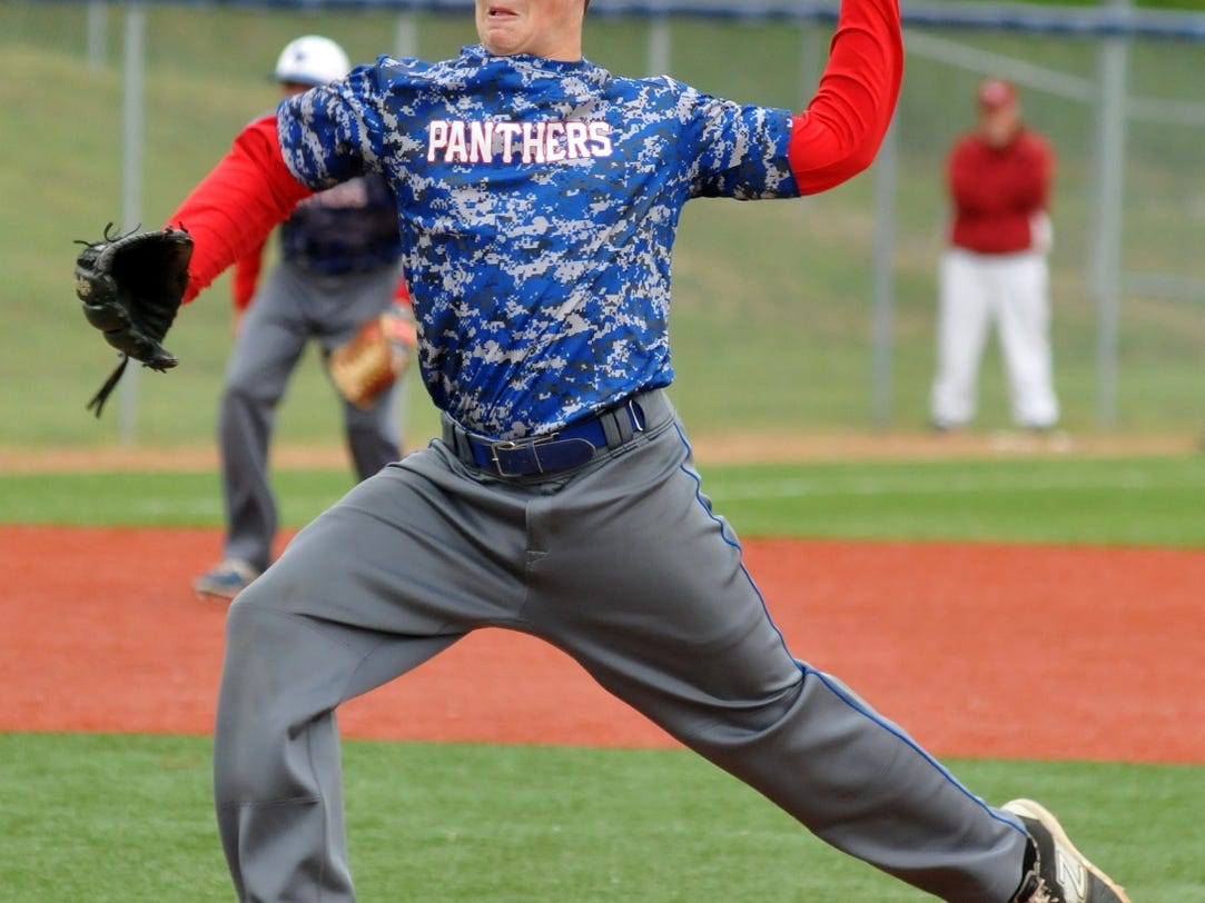 Licking Valley’s Jacob Dennis delivers against Bishop Watterson on Thursday at Lancaster’s Beavers Field. The Panthers lost 2-1 in the Division II district finals.