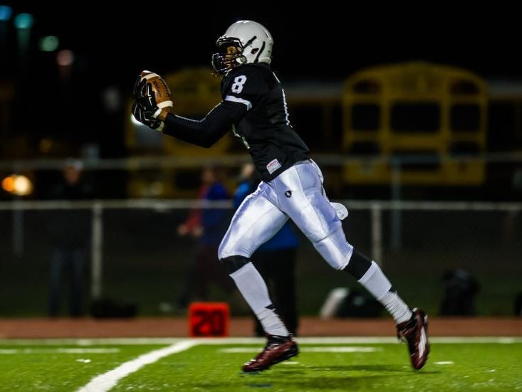 Bridgewater-Raritan's Ricky Tate hauls in a 56-yard pass for a touchdown in the first quarter against Ridge in the North 2 Group V semifinal in Bridgewater on Friday.