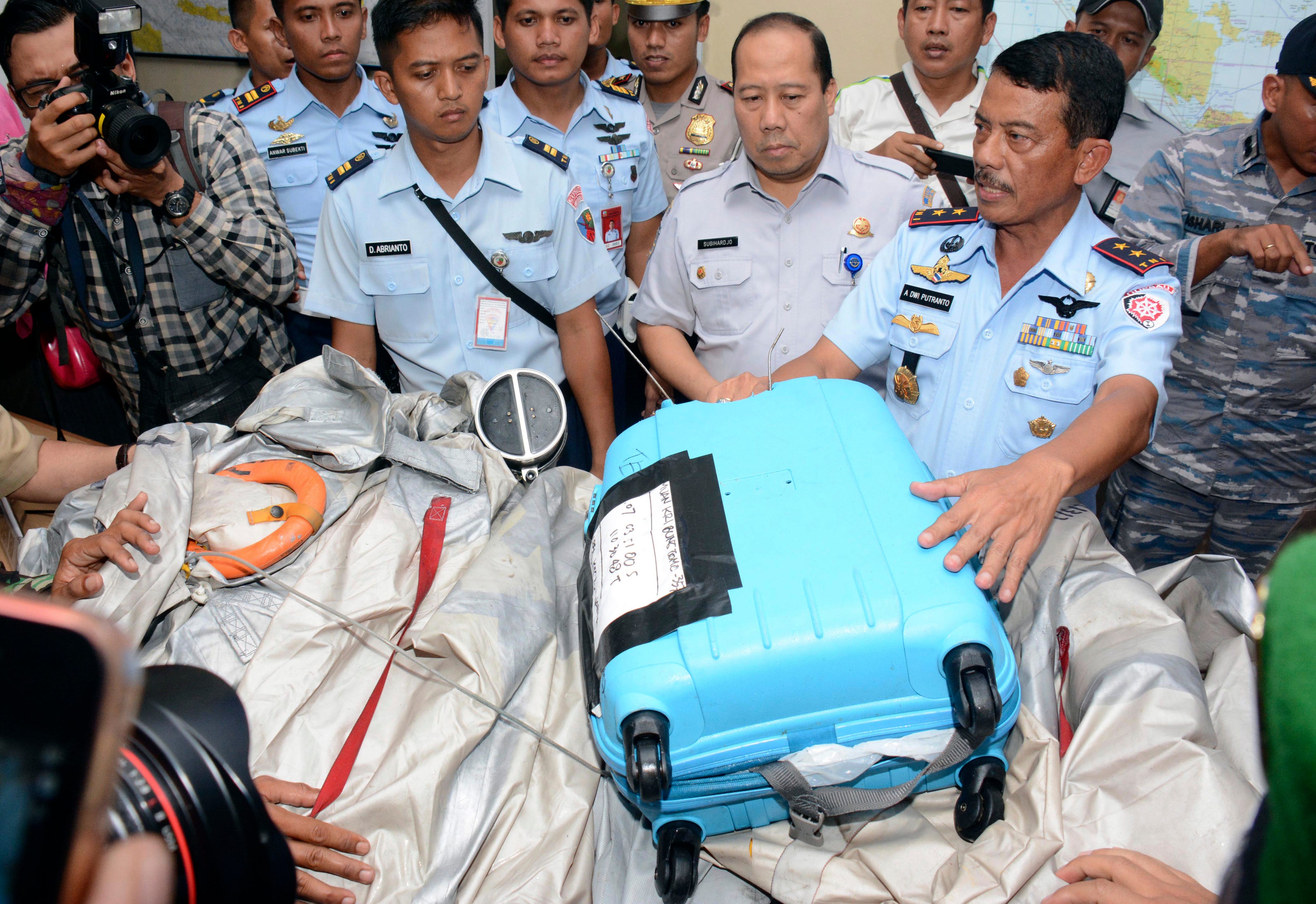 AirAsia heartbreak: Bodies, suitcase, oxygen tank found