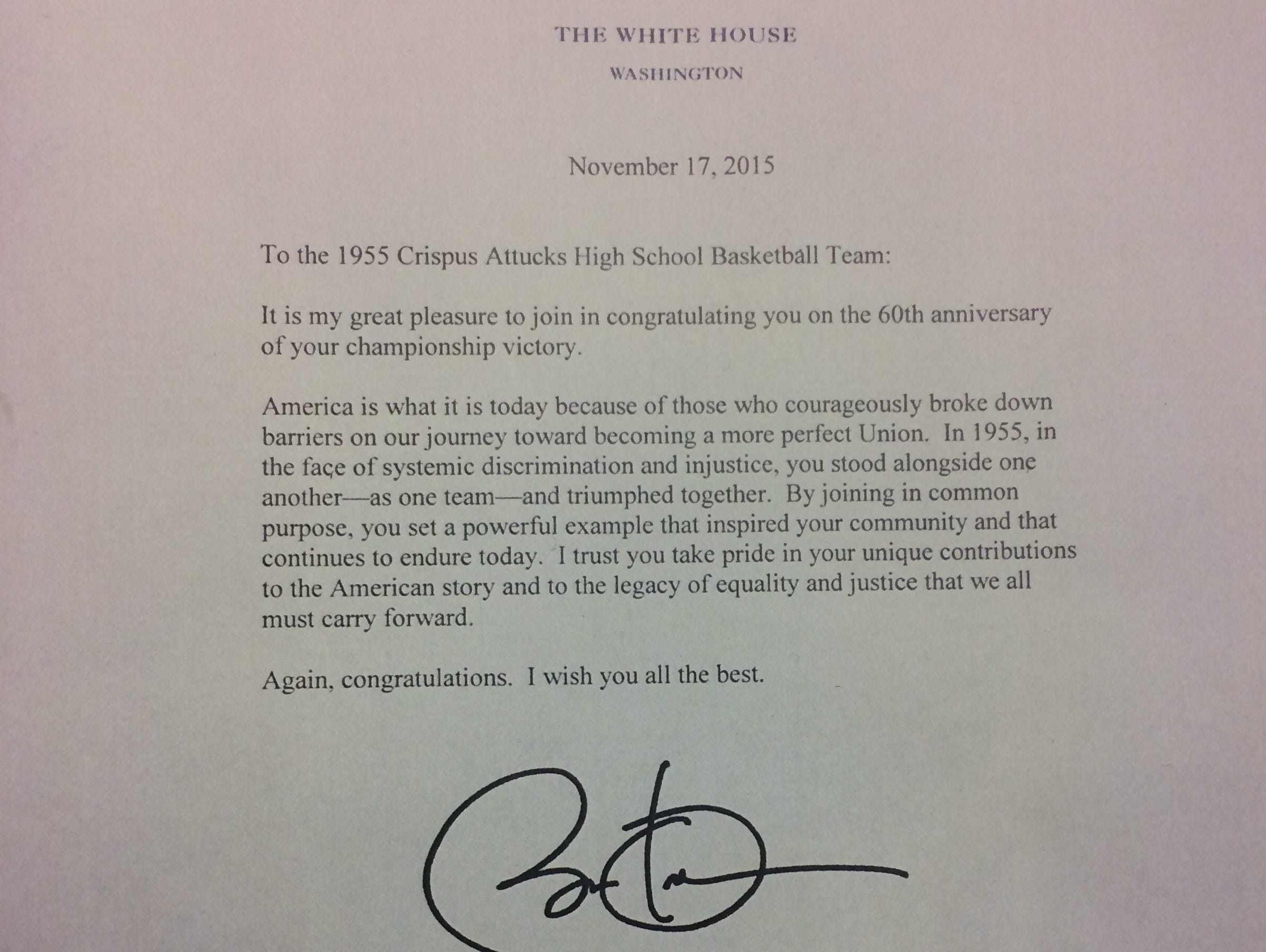 A letter addressed to the 1955 Crispus Attucks basketball team from President Barack Obama.