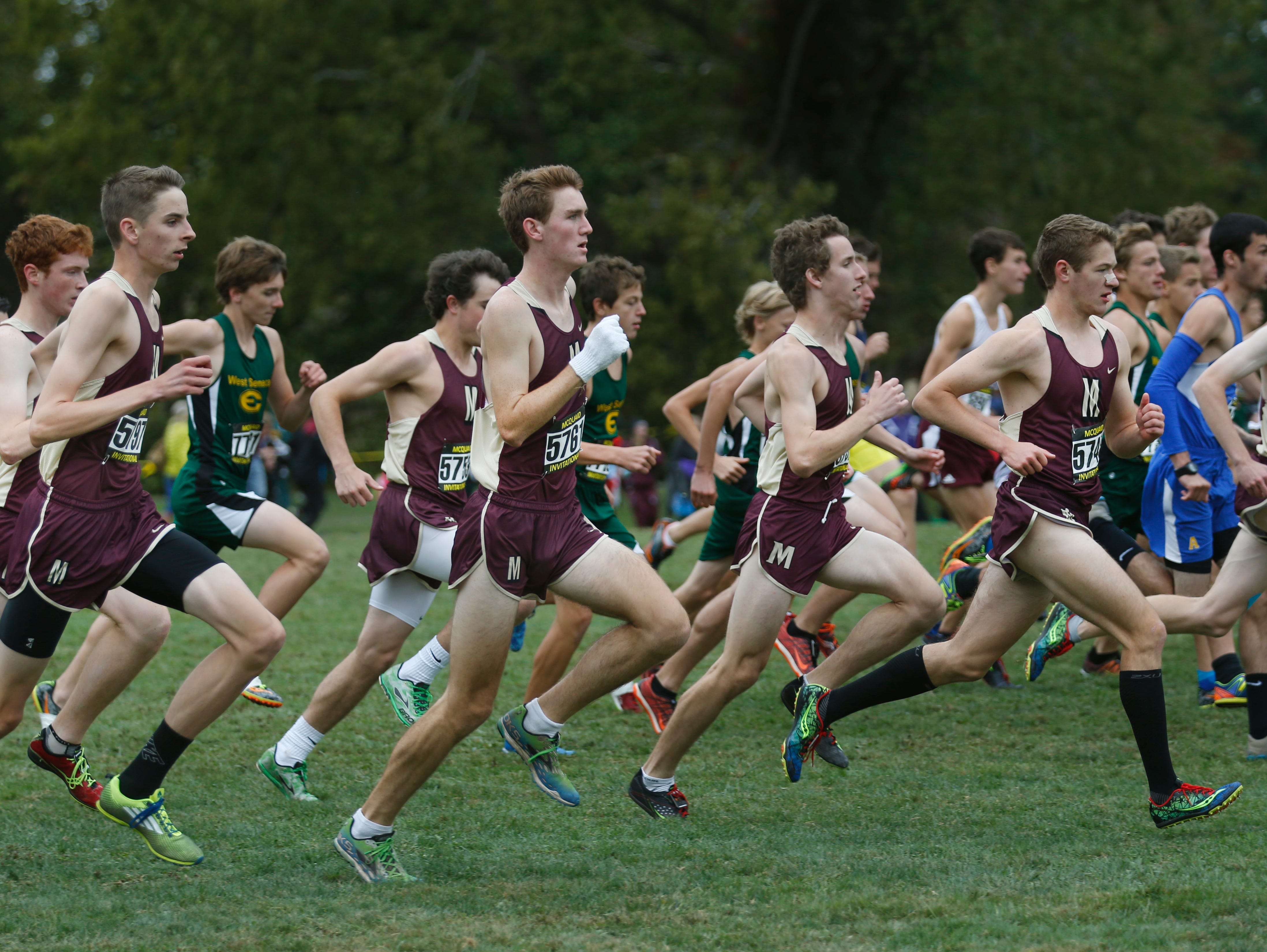 Pittsford Mendon runners start the Boys Varsity Seeded AA race during the McQuaid Invitational cross country meet at Genesee Valley Park.