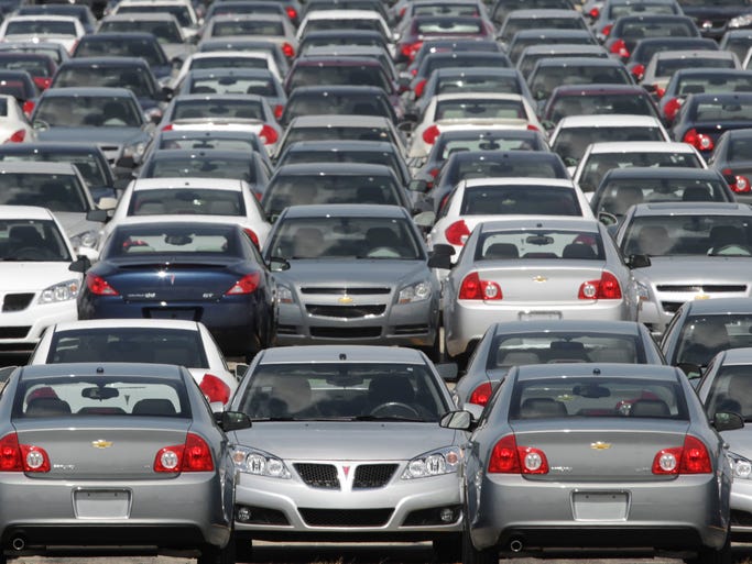 Pontiac G6 and Chevrolet Malibus are shown at the Orion Assembly plant in Orion Township, Mich. Both models are being recalled, covering most model years from 2004 to 2009, as part of the 1.3 million vehicles that General Motors plans to fix to correct a power steering problem.