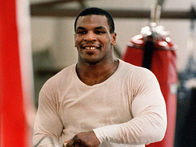 WBA / WBC heavyweight champion Mike Tyson skips rope during his routine exercise at a boxing gym in Tokyo, 10 March 1988. Tyson will fight a title match with challenger Tony Tubbs at Tokyo Dome, 21 March. (Photo credit should read TORU YAMANAKA/AFP/Getty Images)