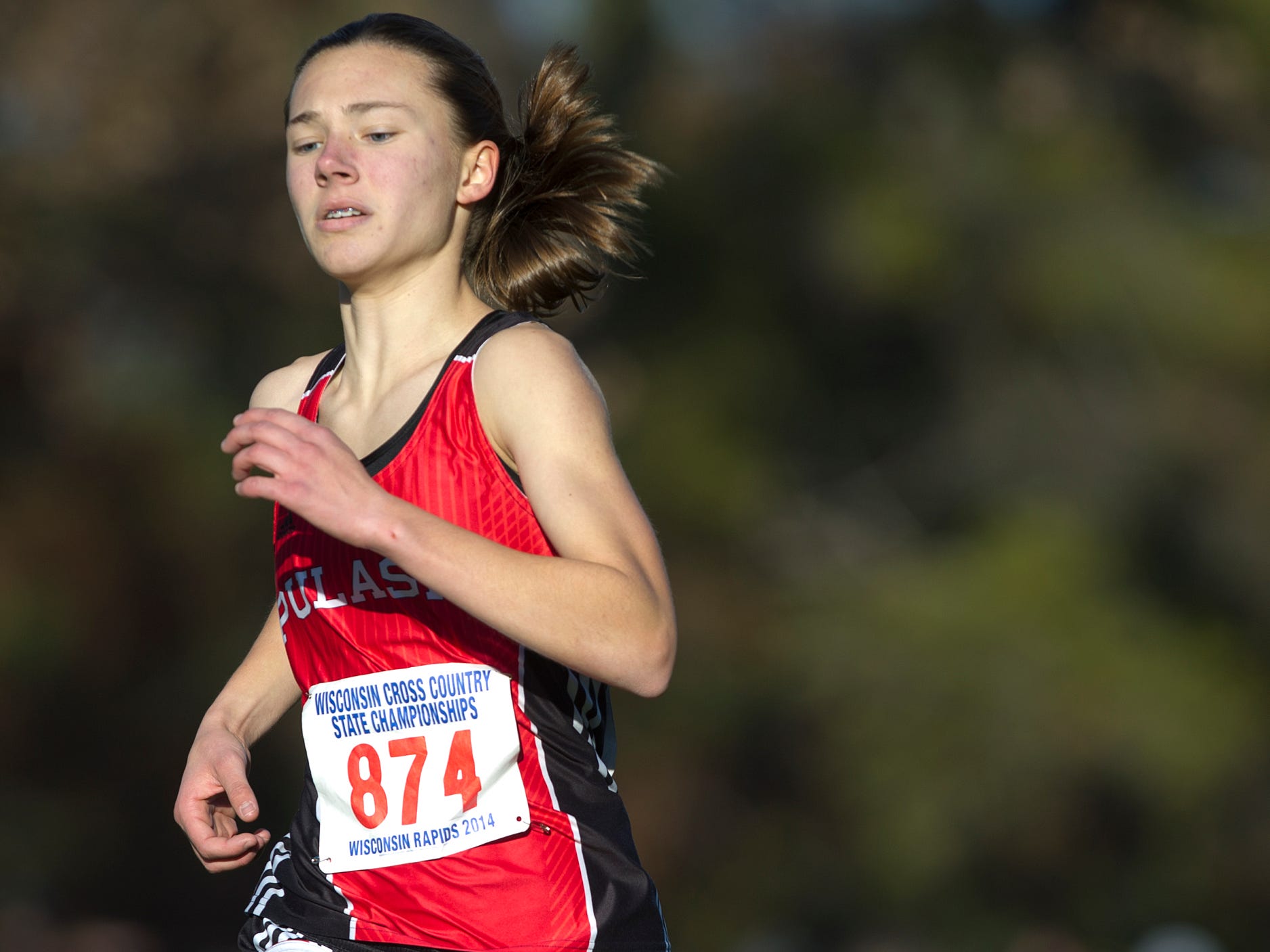 Pulaski’s Kailyn Jessel runs toward the finish line at the WIAA state cross country meet at the Ridges Country Club in Wisconsin Rapids this past November. Jessel placed fifth in the Division 1 race.