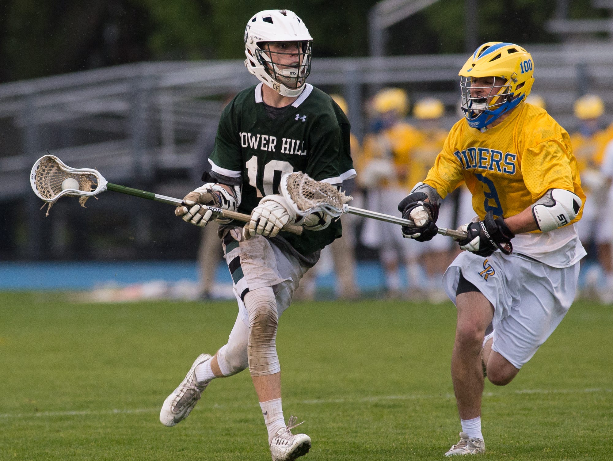 Tower Hill's James Spruance (10) runs down the field with the ball in their 11-9 win over Caesar Rodney.