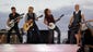 Keith Urban, second from right, performs during an NFL Kickoff event Thursday in Baltimore to celebrate the season-opening game between the Baltimore Ravens and Denver Broncos.