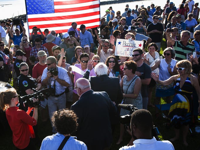 Vermont Sen. Bernie Sanders greets supporters after