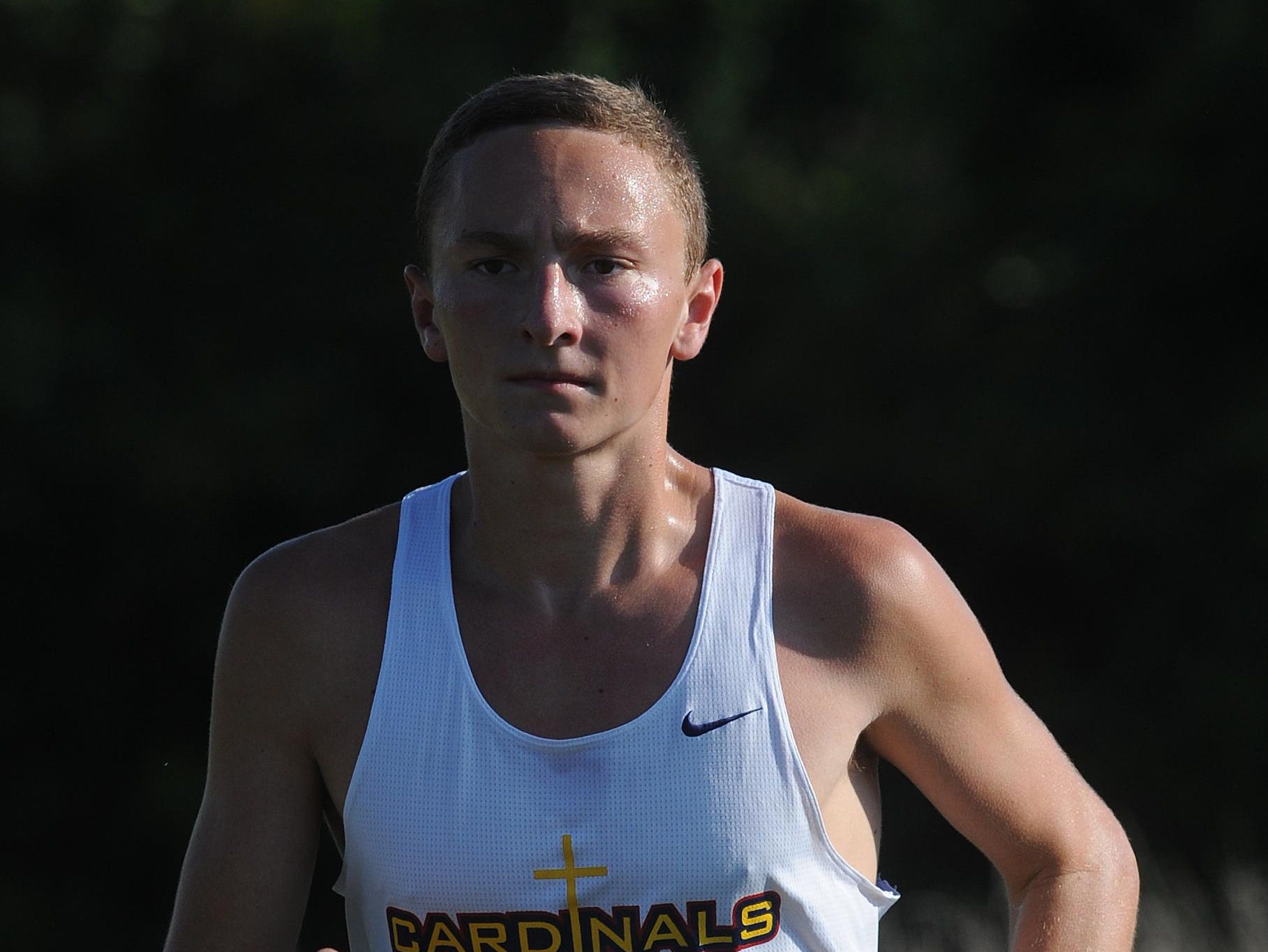 Seton's Jacob Stamm leads the Wayne County Cross Country race at Indiana University East during the 2013 cross country season.