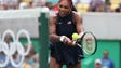 Serena Williams of United States hits a backhand to