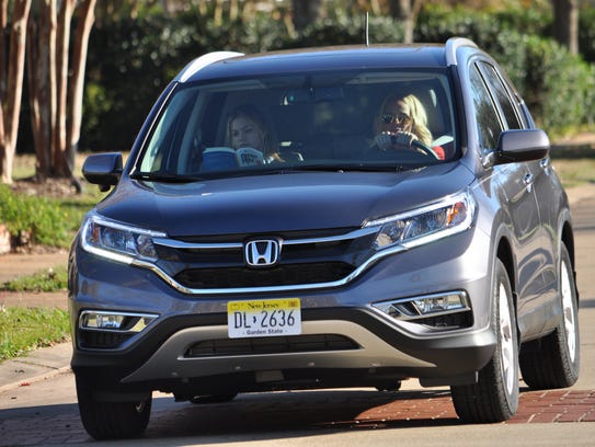 Kristin Chenoweth drives around an Alexandria neighborhood