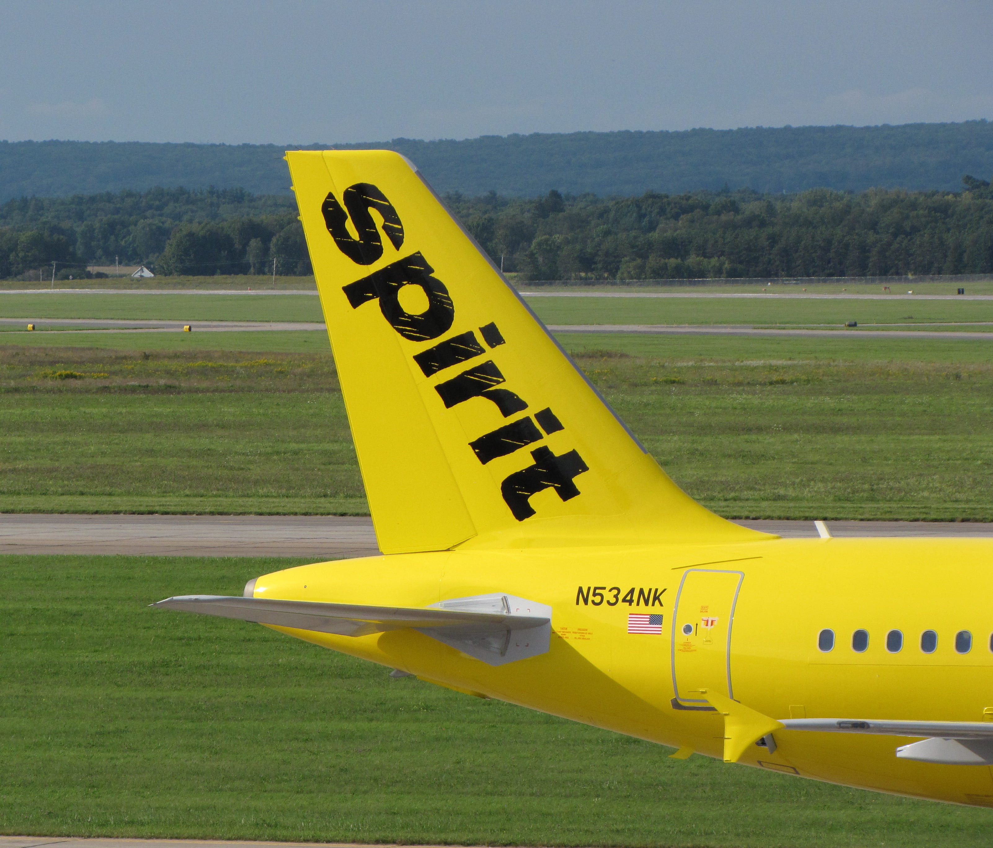 Spirit's first aircraft to get the airline's new paint scheme is rolled outside for photographs at the Premier Aviation Overhaul Center in Rome, N.Y., on Sept. 15, 2014.