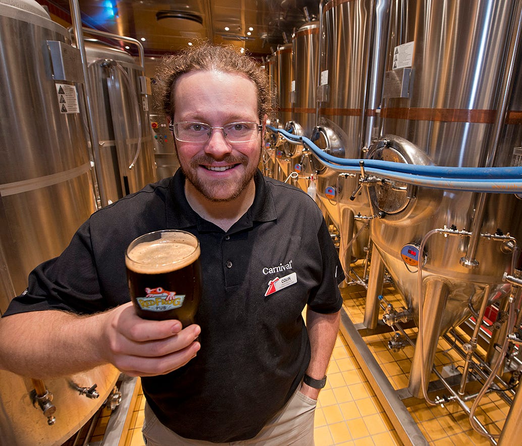 Colin Presby, brewmaster of the RedFrog Pub & Brewery on Carnival Cruise Line's new Carnival Vista, poses in the brewery's fermenting room.