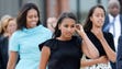 First Lady Michelle Obama, left, with daughters Sasha,