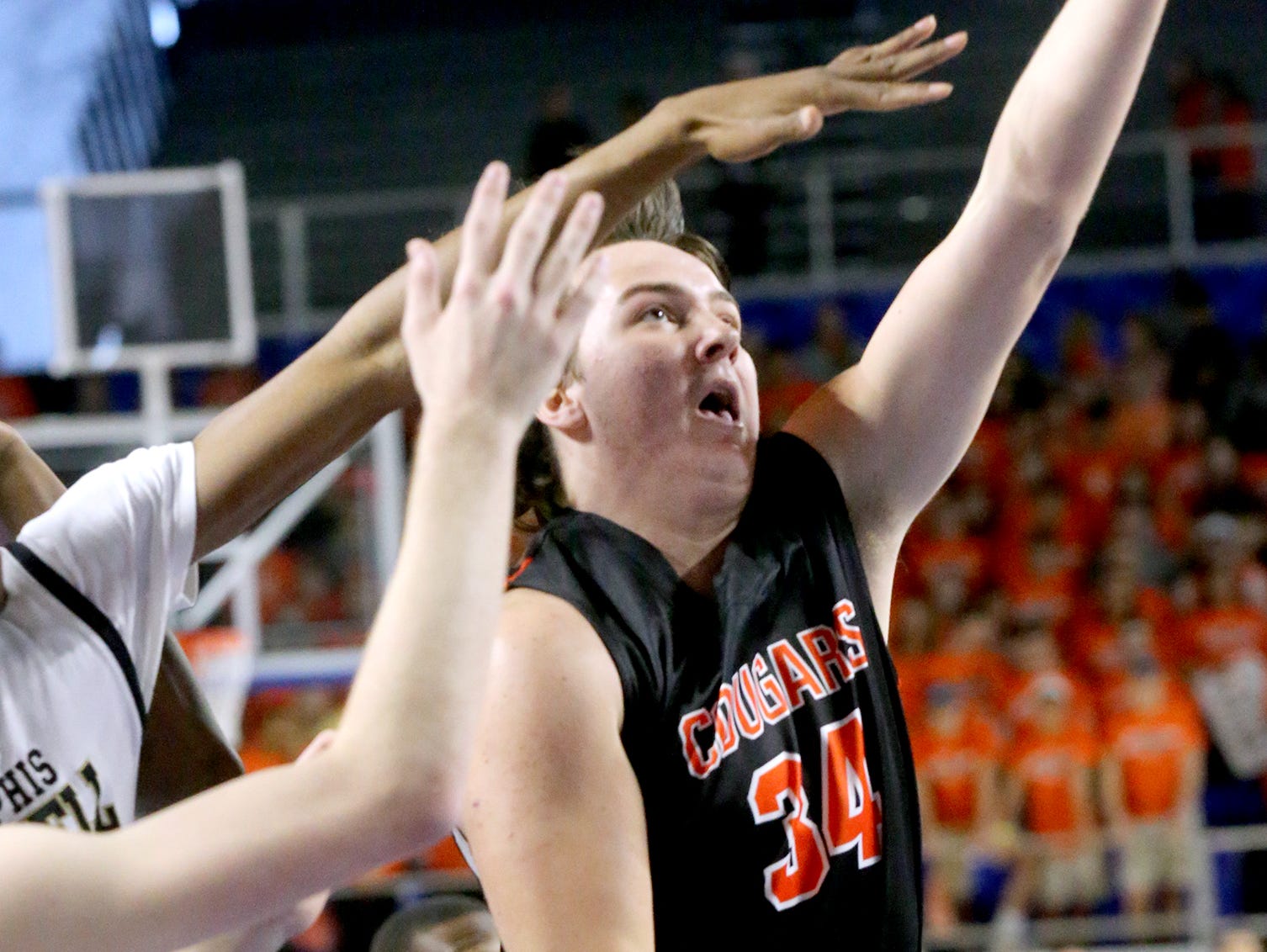 MTCS's Barr Ellenburg (34) goes up for a shot against Mitchell during the state tournament quarterfinal game on Thursday March 17, 2016, at MTSU.