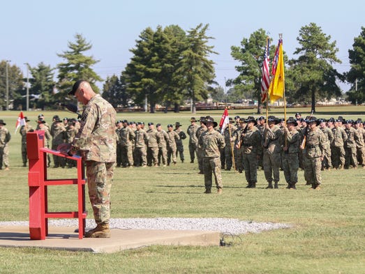 Col. Larry Burris speaks during the color casing ceremony