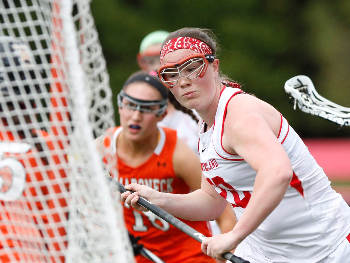 North Rockland's Kaitlyn Gutenberger (20) takes a shot on goal during a girls lacrosse game against Mamaroneck at North Rockland High School in Thiells on Saturday, April 02, 2016.