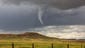 A funnel cloud spins over Knights Ferry, Calif., in