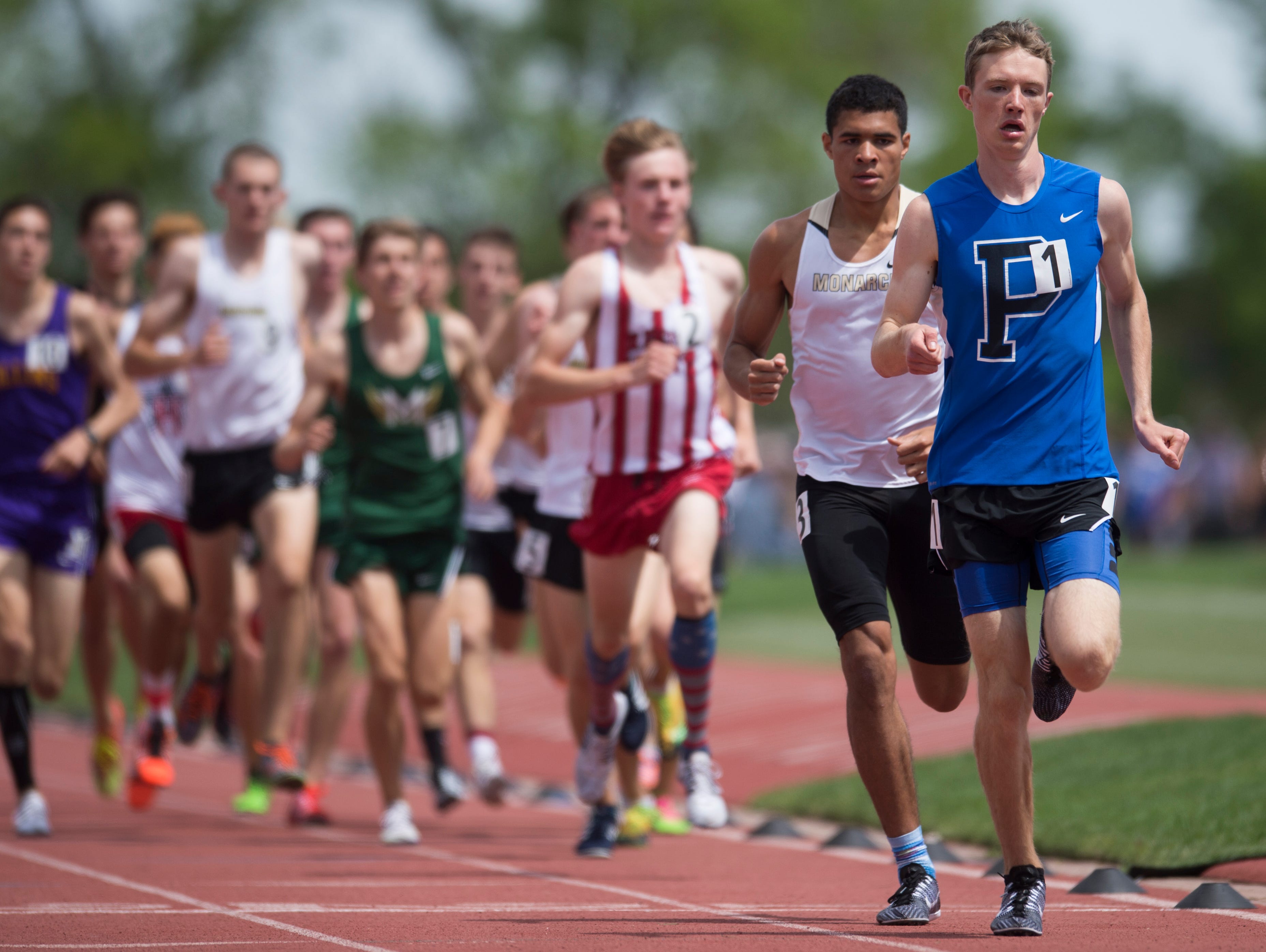 Poudre High School's Henry Raymond sets the pace in the boys Class 5A 1,600 meters Saturday while claiming his third state title in as many days at the Colorado state track and field championships at Jeffco Stadium in Lakewood.