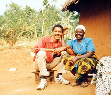 Obama poses with his step-grandmother, Sarah Obama, outside her home in Kogelo, Kenya, in 1995.