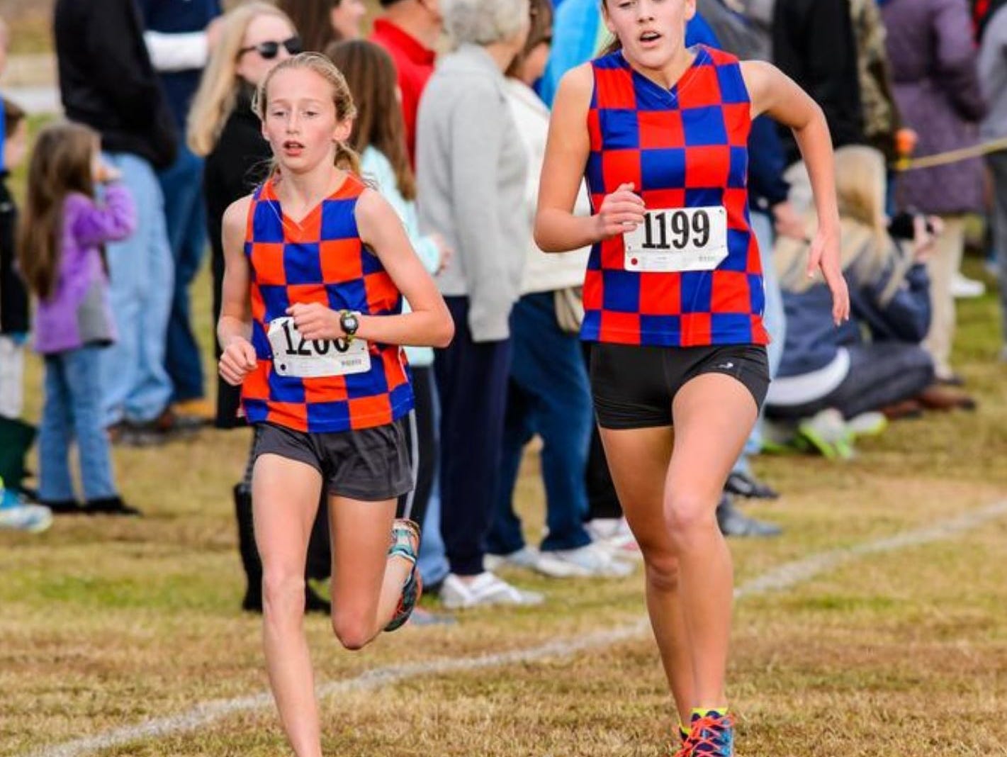 Jessie Crowley, left, Cate Ambrose and the Riverside girls will be after their third straight Class AAA championship at Saturday's state meet.