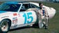 Buddy Baker poses with his car at Daytona International