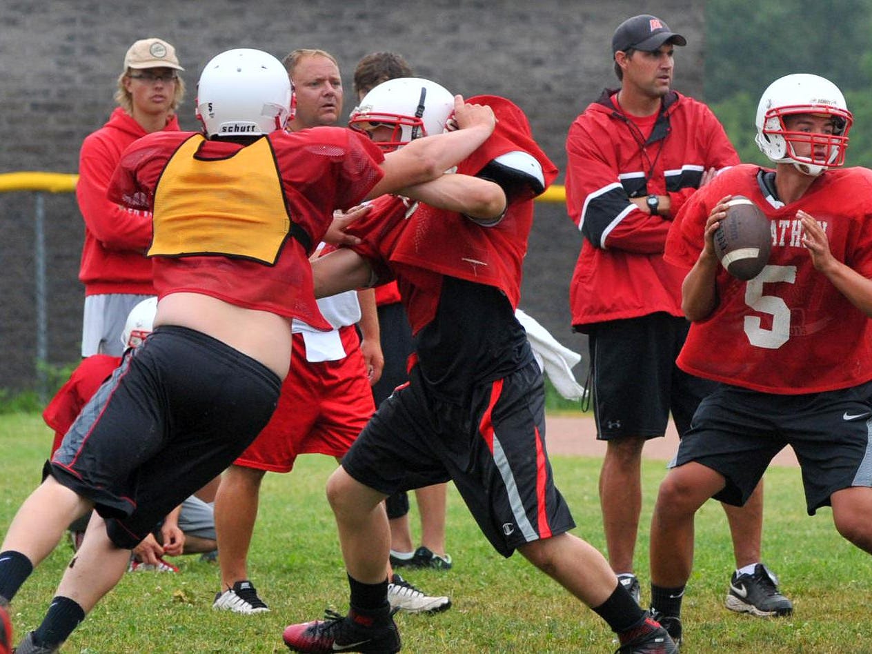 Members of the Marathon football team go through a drill during practice late last week.