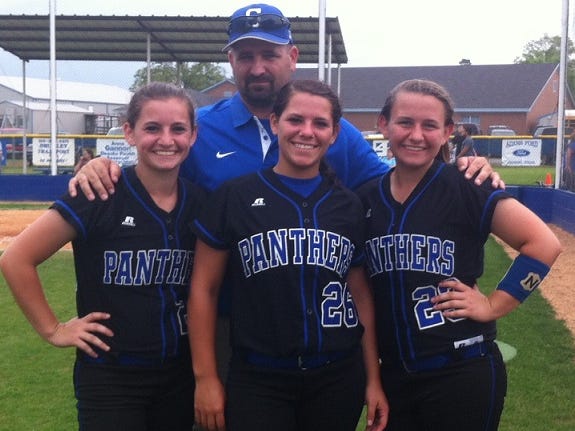 Alyssa, Emily and Shorty Welborn of Stanley pose with their father, David, following a game this season. The sisters will lead Stanley into the Class B state playoffs this weekend.