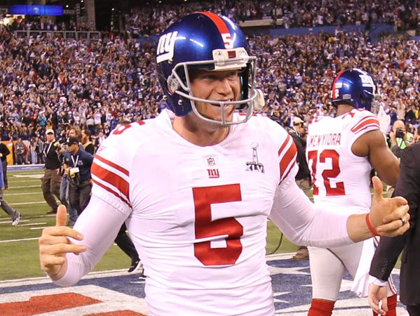 New York Giants punter Steve Weatherford (5), a native of Terre Haute, IN, celebrates his team's 21-17 win over the New England Patriots following Super Bowl XLVI, Sunday, Feb. 5, 2012 at Lucas Oil Stadium in Indianapolis, Ind. Robert Scheer/The Star