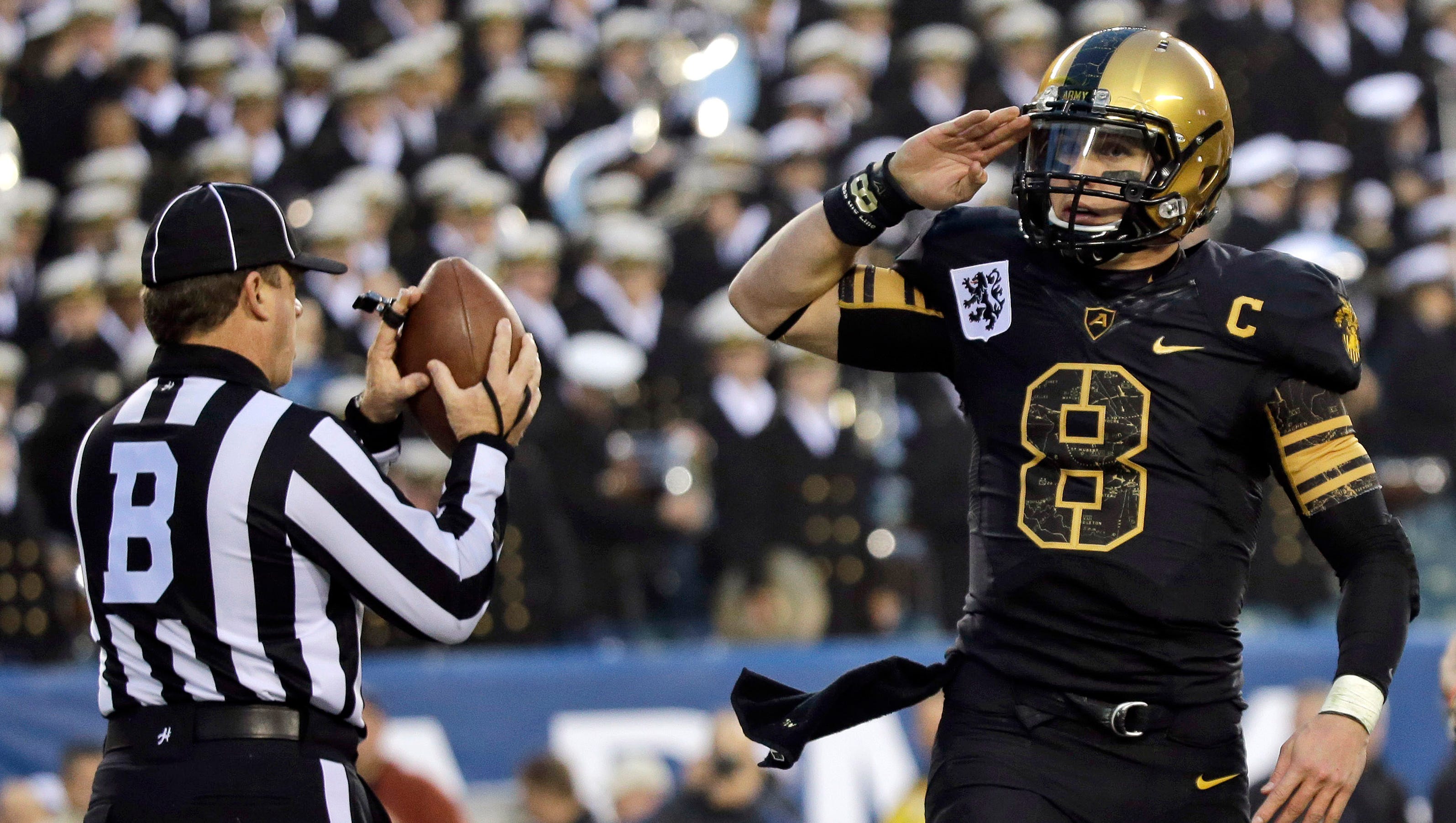 Army and Navy football teams play hard and play clean